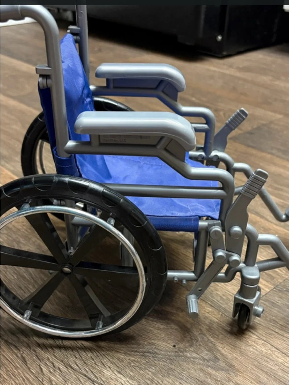 18in Doll Wheelchair Purple with purple crutches